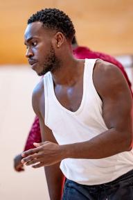 Photo of Romario Simpson - actor who played Galahad in the revival of Sam Selvon's The Lonely Londoners at the Kiln Theatre- Kilburn, London